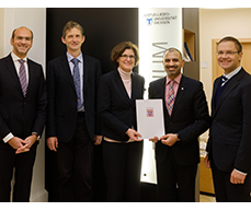  ZEW\'s Professor Irene Bertschek is presented with her certificate of appointment at JLU Giessen together with ZEW Director Thomas Kohl (on the right).